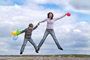 woman-and-boy-leaping